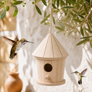 Nichoir cylindrique en bois à toit facetté