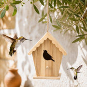 Nichoir en bois à façade découpée et toit ondulé