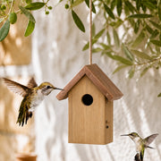 Nichoir en bois à toit en cuivre marron